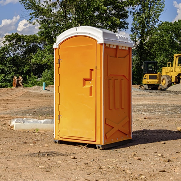 how often are the porta potties cleaned and serviced during a rental period in Wolfe